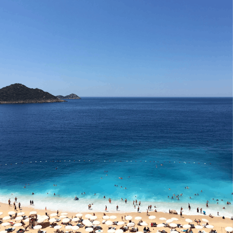 Make the short walk downhill to the beach and harbour of Kalkan