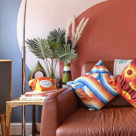 Relax with a cup of tea in the 70s-inspired living room