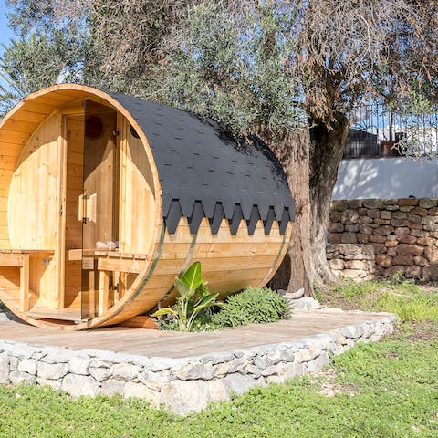 Unwind and relax in the garden's unique barrel sauna