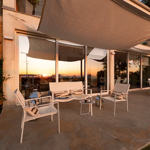 Sip sundowners on the terrace