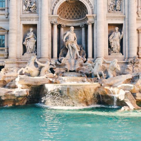 Witness the beauty of the Trevi Fountain, less than twenty minutes' walk from your home