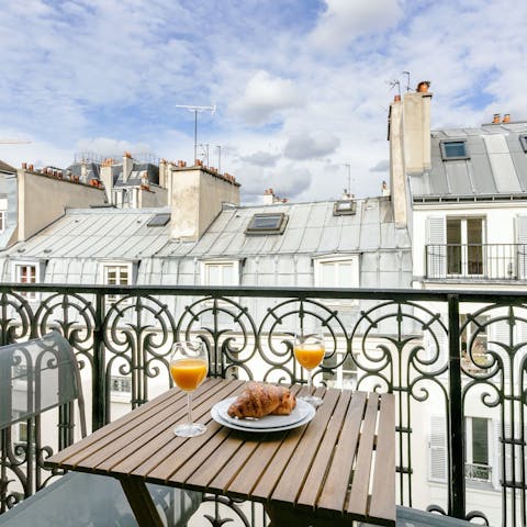 Enjoy the magic of Parisian living from the little balcony 