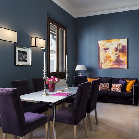 Admire the rich velvet and midnight-blue decor in the living room