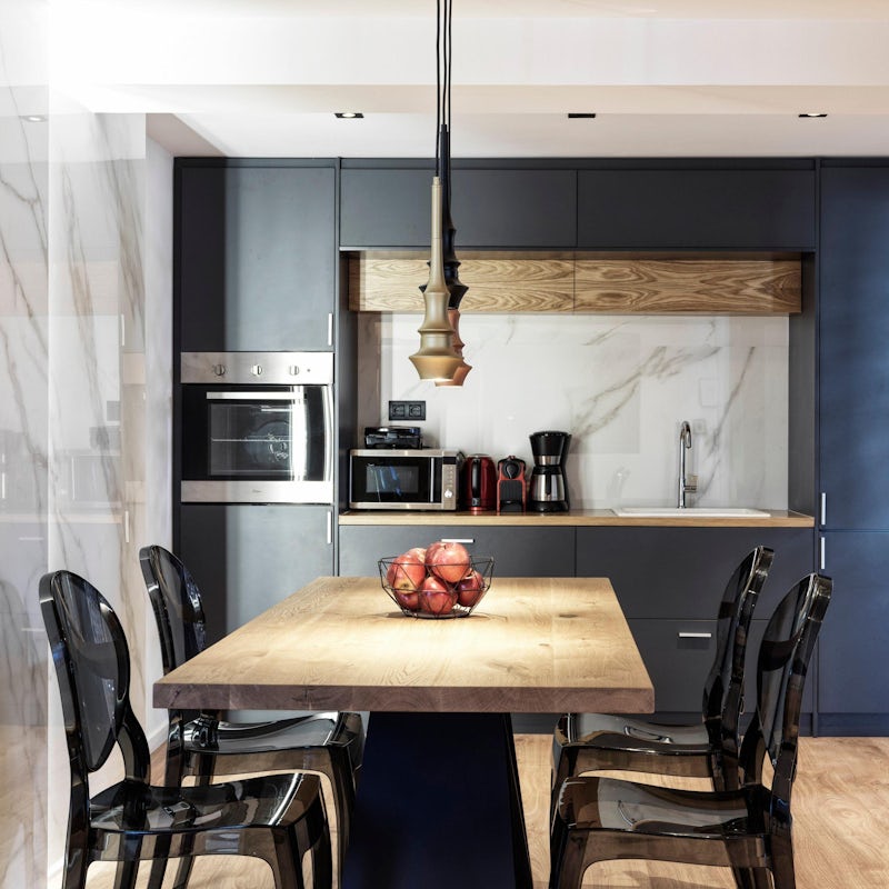 Sit down to a celebratory meal in the sleek kitchen-dining area