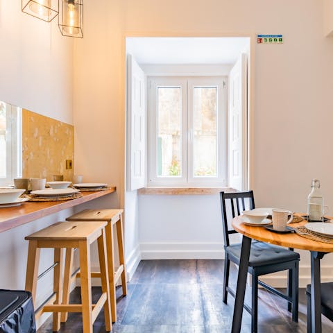 Share pasteis de natas and coffee around the dining area for breakfast