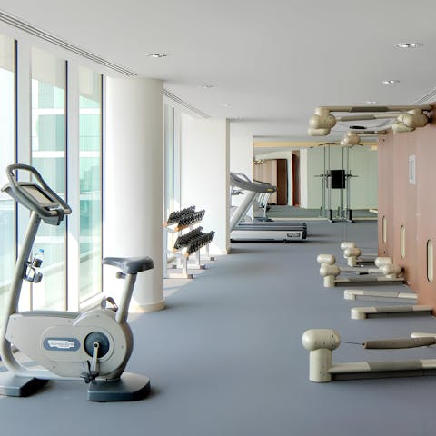 Keep up your fitness routine in the shared gym on site