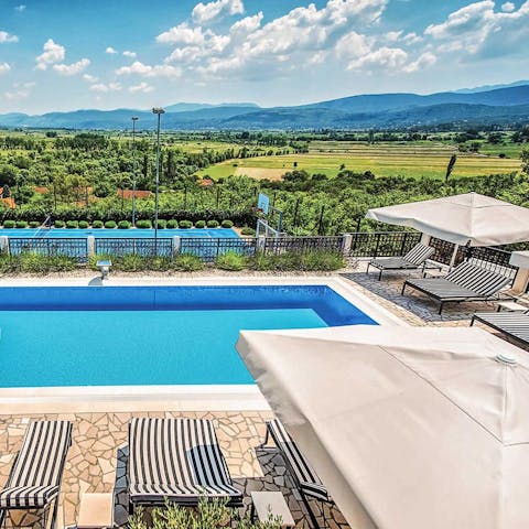 Take in the stunning views from the terraces and balconies