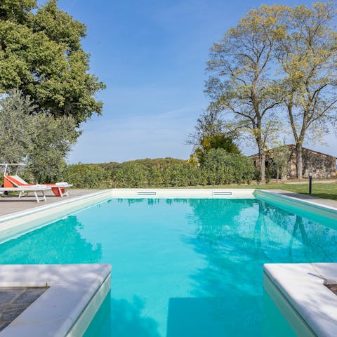 Take a dip in the pure turquoise swimming pool