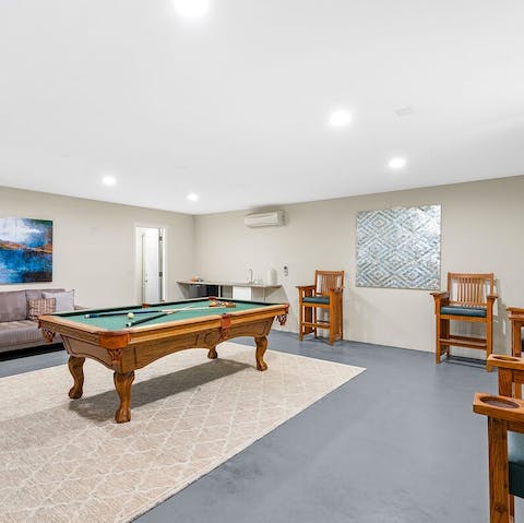 Challenge friends to a pool and poker night