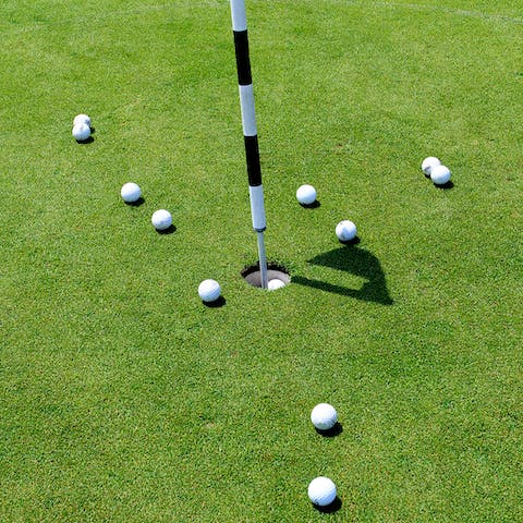 Pitch and putt at home or take to a nearby golf course, an eleven-minute drive away