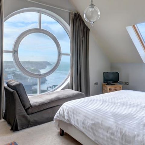 Enjoy uninterrupted sea views from the master bedroom's feature window