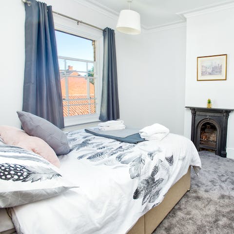 Relax in the cosy bedroom with period features