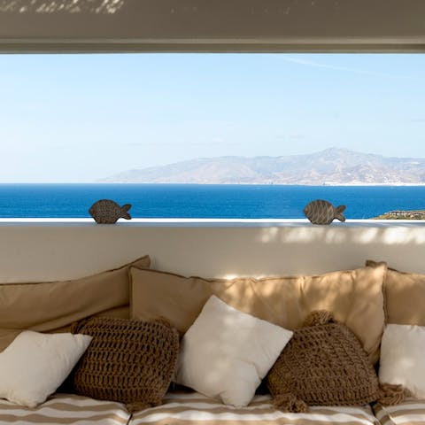 Flop down on the outdoor sofa and admire the sea views