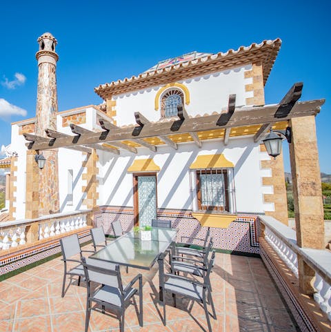 Dine alfresco on your villa's stunning balcony