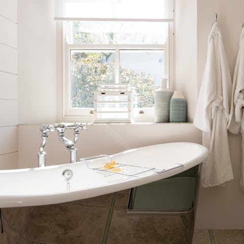 Treat yourself to a soak in the freestanding bathtub