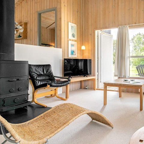 Spend cosy evenings inside by the wood-burning stove