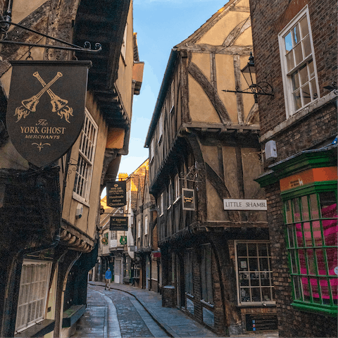 Stroll through the streets of medieval buildings of The Shambles, six minutes away