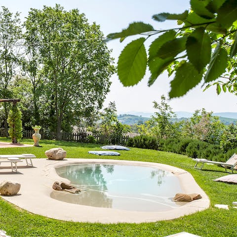 Cool off during the Italian summer in the home's swimming pool