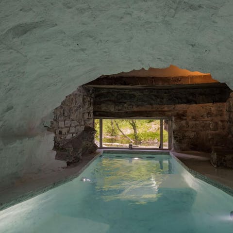 Relax in the homes private underground jacuzzi within the ancient vault of this mill
