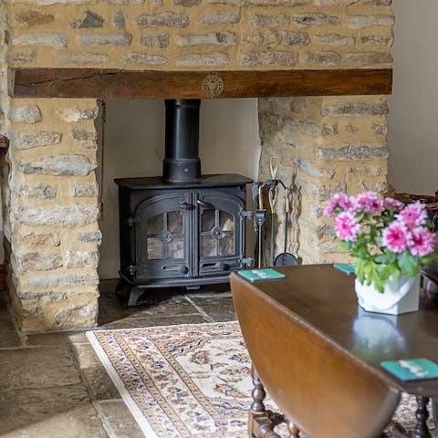 Cosy up in the sitting room in front of the wood burning stove