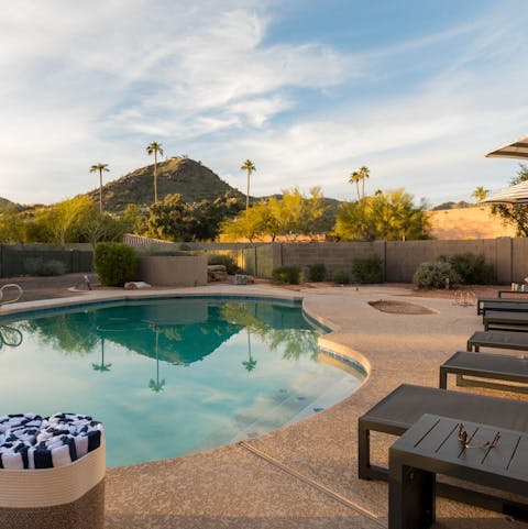 Lounge around the swimming pool with that stunning view