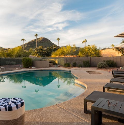 Lounge around the swimming pool with that stunning view