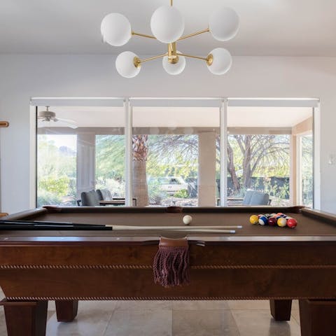 Play a game of pool when you want to escape the heat for a bit