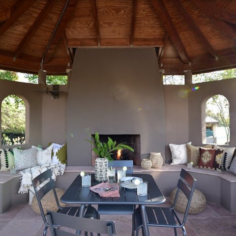 Light the fire in the gazebo and keep the desert chill at bay