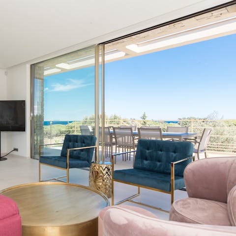 Throw open the huge glass doors in the living room to let in some fresh coastal air