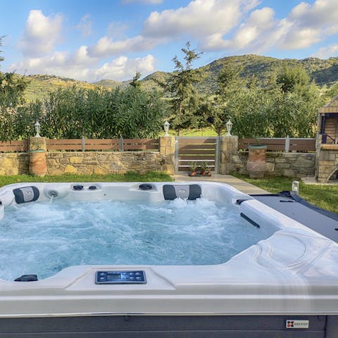 Treat yourself to a fruity cocktail and a long soak in the hot tub