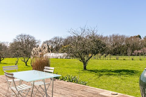 Enjoy the Breton sea breeze from your private deck, as you overlook the greenery