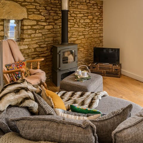 Make yourself cosy by the wood-burning stove