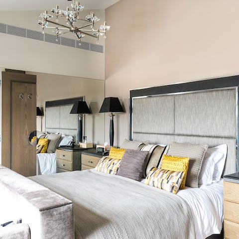 Get a restful night's sleep in the grand master bedroom