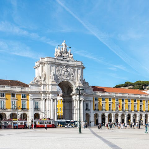 Catch the famous Tram 28 to Praça do Comércio and soak up views of the Tagus River