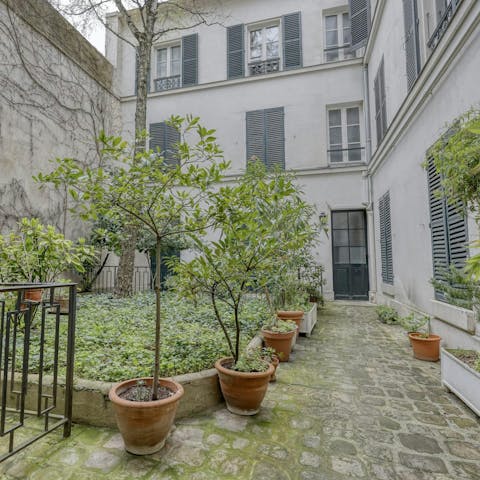 Take in the Parisian air in the shared courtyard