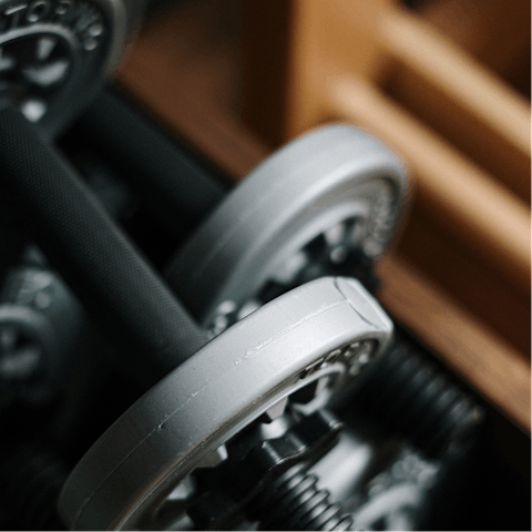 Stay on top of your fitness goals with a workout at the communal gym