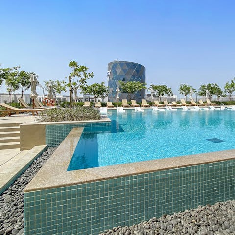 Spend a day relaxing by the tranquil pool – the perfect counterbalance to Dubai's bustle