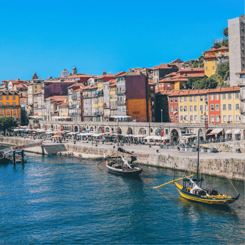 Find a sunny spot for drinks down at Cais da Ribeira – within walking distance