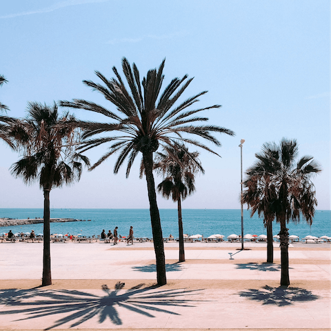 Hail a taxi to get to Barceloneta Beach in just twenty minutes