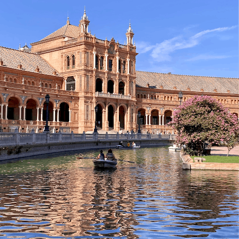Pick up some oars and paddle around the Plaza de España, a short bus ride away
