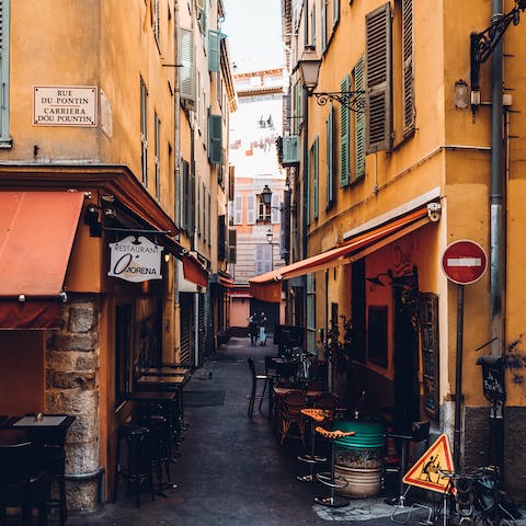 Take a stroll down the colourful backstreets, just an eleven–minute walk away from the apartment
