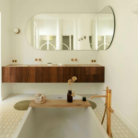 End your day with a long soak in the bath tub