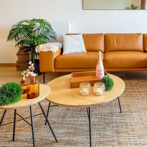 Relax in the mid-century chic surrounds of the open-plan living room