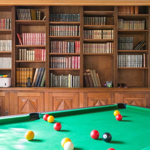 Play billiards in the library