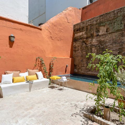 Soak up the Spanish sunshine from the pool or outdoor sofas