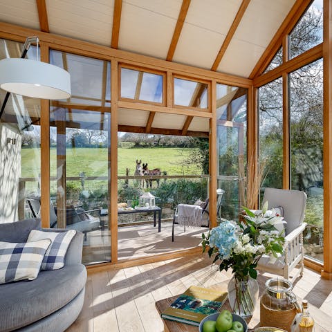 Immerse yourself in the elements thanks to the spectacular sunroom