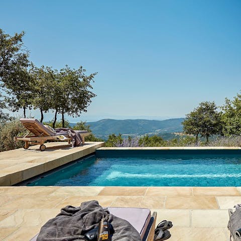 Work on that perfect tan by the pool, surrounded by breathtaking views