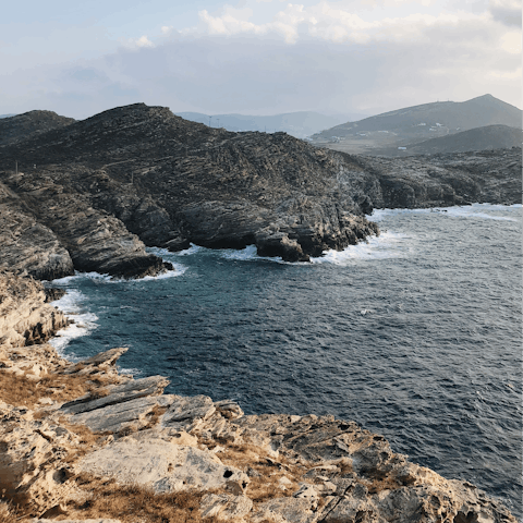 Discover the rugged cliffs and unique beaches of the island