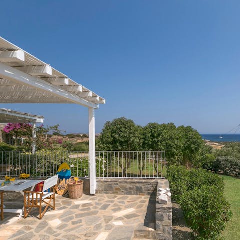 Enjoy alfresco meals with sea views on the private veranda