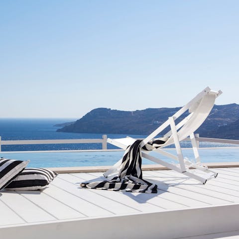 Grab a deckchair and admire the stunning sea views in the sunshine